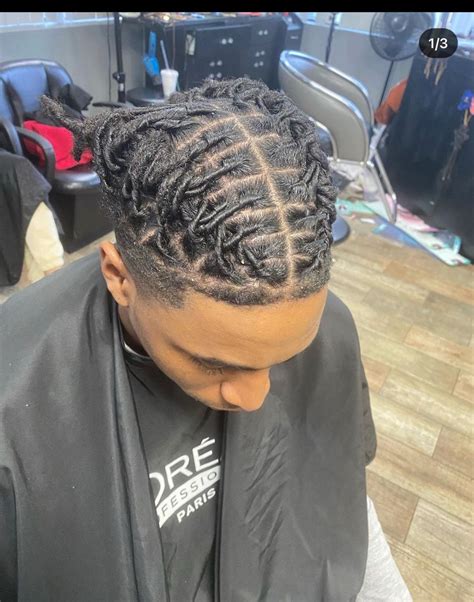 Take the portion of hair that you want to deal with in this step. . Barrel twist locs